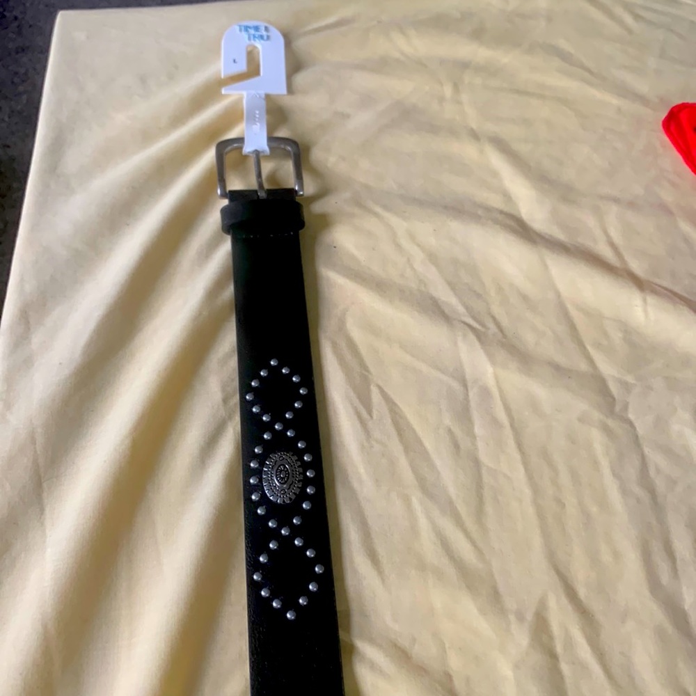 Black belt. Brand new, never worn. Size Large.